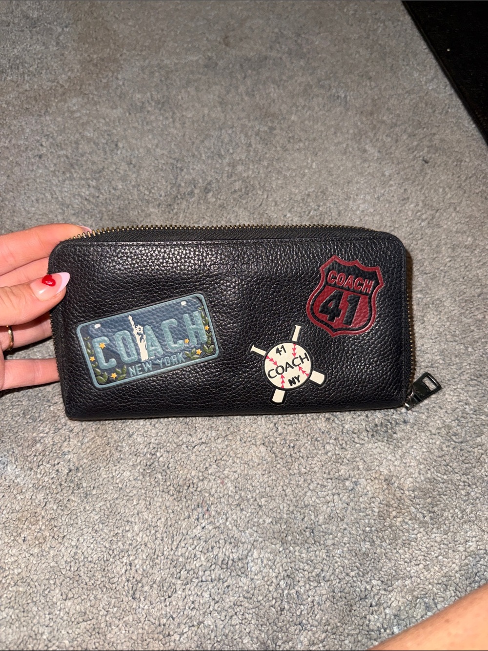 Coach black pebbled leather zip-around wallet